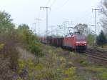 152 036-0 mit ihrem Güterzug macht das kühle herbstliche Wetter nichts aus. 25.10.2014, Berlin Wuhlheide / Biesdorf