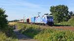 DB Cargo 152 136  AlbatrosExpress TFG & DB Intermodal  mit Containerzug in Richtung Bremen (Rohrsen, 02.08.2022).