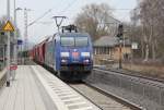 152 135-0 zieht einen Kali-Zug in sdliche Richtung. Aufgenommen am 19.03.2013 in Wehretal-Reichensachsen.