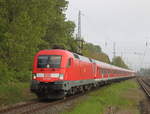 182 004 mit Kf 13292 von Warnemünde nach Berlin-Zoologischer Garten bei der Durchfahrt am 18.05.2019 in Rostock-Bramow.