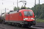 Die 182 015-8 mit einen gemischten Gterzug in Kln West, am 12,08,09