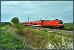 Bei Zschortau rollt 182 023-2 mit der S 37253 Richtung Leipzig. (09.04.2016)