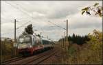 183 001 mit Alex nach Mnchen Hbf am 26.09.2010 in Kfering.