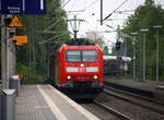 185 047-8 DB kommt mit einem Audi-VW-Skoda-Zug aus Osnabrück nach Kortenberg-Goederen(B) und kommt aus Richtung Mönchengladbach-Hbf,Rheydt-Hbf,Wickrath,Beckrath,Herrath und fährt durch Erkelenz in Richtung Baal,Hückelhoven-Baal,Brachelen,Lindern,Süggerath,Geilenkirchen,Frelenberg,Zweibrüggen,Übach-Palenberg,Rimburg,Finkenrath,Hofstadt,Herzogenrath, Kohlscheid,Richterich,Laurensberg,Aachen-West. 
Aufgenommen vom Bahnsteig 1 in Erkelenz. 
Bei Wolken am Nachmittag vom 4.5.2017.