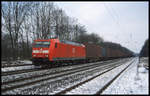 DB 185054-4 fährt hier am 1.2.2003 mit einem Güterzug Richtung Münster durch den Bahnhof Natrup-Hagen.