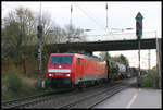 185051 fährt hier am 1.11.2005 mit einem Güterzug in Richtung Ruhrgebiet durch den Bahnhof Hasbergen.
