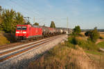 185 082 mit einem Kesselwagenzug bei Oberdachstetten Richtung Würzburg, 19.09.2019