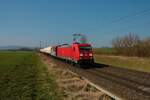 DB Cargo 185 210-2 mit einem Mischer am 25.03.22 in Nieder Mörlen 