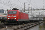 DB Lok 185 130-2 durchfährt am 22.02.2023 den Bahnhof Pratteln.