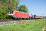 185 081-7 mit einem gemischten Güterzug bei Himmelstadt am 30.04.2024.