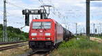DB Cargo AG, Mainz mit ihrer  185 354-8  [NVR-Nummer: 91 80 6185 354-8 D-DB] und einem gemischten Kesselwagenzug am 08.07.24 Höhe Bahnhof Magdeburg Neustadt.