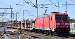 DB Cargo AG, Mainz mit ihrer  185 369-6  [NVR-Nummer: 91 80 6185 369-6 D-DB] und einem PKW-Transportzug (leer) am 02.09.24 Höhe Bahnhof Rodleben.