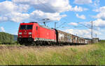 Mit Schiebewandwagen am Haken rollt 185 233-4 am BÜ 239,6 bei Niedernjesa Richtung Göttingen.

🧰 DB Cargo
🕓 15.6.2024 | 16:18 Uhr