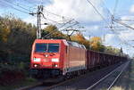 DB Cargo AG, Mainz mit ihrer  185 288-8  [NVR-Nummer: 91 80 6185 288-8 D-DB] und einem Ganzzug Hochbordwagen am 23.10.24 Höhe Bahnhof Berlin Hohenschönhausen.