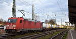 DB Cargo AG, Mainz mit ihrer  185 373-8  [NVR-Nummer: 91 80 6185 373-8 D-DB] und einem Containerzug am 25.11.24 Höhe Bahnhof Magdeburg-Neustadt.