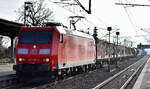 DB Cargo AG, Mainz [D] mit ihrer  185 185-6  [NVR-Nummer: 91 80 6185 185-6 D-DB] und einem gemischten Güterzug am 20.01.25 Durchfahrt Bahnhof Roßlau (Elbe).