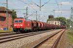 185 213 Railion zieht ihren Gterzug durch Hagenow Richtung Hamburg.