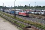 185 209-4 brachte am 07.07.2009 einen Containerzug in den Seelzer Rbf.hier bei der Einfahrt.