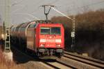 185 271-4 Railion mit Kesselwagen kurz nach Staffelstein am 22.02.2012.