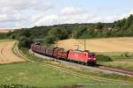 185 295-3 (Railion DB Logistics) fhrt am 14. Juli 2012 um 15:53 Uhr mit einem Gterzug durch Edlhausen
