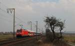 185 171-6 fuhr am 18.03.2013 mit einem gemischten Gterzug von Osnabrck nach Emden, hier bei Veenhusen.