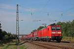 185 132-8 brachten am Morgen des 11.07.2013 den Winner-Spedition KLV aus der Schweiz nach Deutschland. Hier fhrt der Zug in Nrdliche Richtung durch die berholgleise in Orschweier.