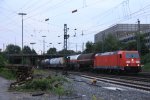 185 345-6 DB  kommt aus Richtung Kln,Aachen-Hbf mit einem langen Kesselzug aus Ludwigshafen-BASF nach Antwerpen-BASF(B) und fhrt in Aachen-West ein in der Abendstimmung am 2.9.2013.