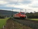 185 242-5 mit einen Aufliegerzug bei Hermannspiegel am 18.12.13.