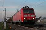 Am 29.03.2014 fuhr die DB Schenker 185 110-4 mit einem gemischten Güterzug hinter sich durch den Bahnhof von Auggen gen Schweiz.