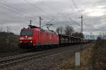Am 14.02.2014 bespannte 185 115-3 einen  gemischten Güterzug, als sie in den Bahnhofsbereich von Müllheim (Baden) in nördliche Richtung einfuhr.