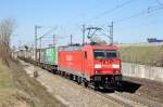 Endlich mal wieder DB-Rot auf der 950er: 185 264 am 29.03.14 bei Waldtrudering/München
