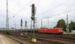 185 183-1 und 185 156-7 beide von DB fahren mit einem langen Ölzug aus Antwerpen-Petrol(B) nach Basel(CH) bei der Ausfahrt aus Aachen-West und fahren in Richtung Aachen-Schanz,Aachen-Hbf,Köln. 
Aufgenommen vom Bahnsteig in Aachen-West am 6.8.2014.