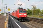 Am 25.04.2014 fuhr 185 109-6 zusammen mit 185 101-3 und einem gemischten Güterzug durch den Bahnhof von Müllheim (Baden) gen Süden.