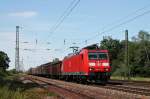 Durchfahrt am 06.06.2014 von 185 117-9 mit einem gemischten Güterzug in Orschweier gen Süden.