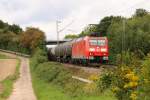 185 094-0 mit einem Kesselzug kurz vor Bietigheim-Bissingen. Die Aufnahme entstand am 23.08.2014. 