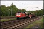 Mit einem langen Röhrenzug in Richtung Norden kam am 11.5.2015 morgens um 7.09 Uhr die DB 185104 durch den Bahnhof Hasbergen. 