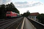 Am Abend des 25.06.2014 fuhr 185 214-4 mit einem vollen PKP Cargo Kohlezug über die Donaubrücke bei Mariaort in Richtung Süden.