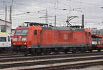 DB Lok 185 118-7 durchfährt solo den badischen Bahnhof.