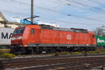 DB Lok 185 134-4 durchfährt solo den Bahnhof Pratteln.