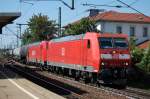185 011-4 zieht am 26.07.07 mit einer weiteren Schwestermaschine einen Kesselwagenzug aus dem Bahnhof Stuttgart-Untertrkheim.
