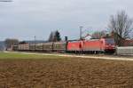 185 314-2 und eine kalte 185 mit einem gemischten Güterzug bei Pölling Richtung Neumarkt Opf.,03.03.2014
