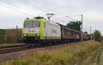 185 505 der Captrain schleppte am 17.08.19 einen Schiebewandwagenzug auf dem Gegengleis durch Jeßnitz Richtung Bitterfeld.