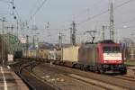 185 599-8 in Crossrail Diensten bei der Durchfahrt in Kln Messe/Deutz am 09.03.2012