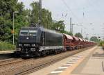 185 569-1 zieht einen Kaliwagen-Zug durch Recklinghausen Sd. Aufgenommen am 28.06.2012.