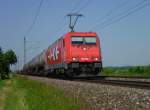 185 630-1 der HGK Durchfuhr am 18.06.13 mit einem Kesselzug Neu-Ulm.