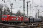 HGK 2066 (185 631)+HGK 2055 (185 587) am 17.3.13 mit einem Kohlezug in Kln-Gremberg.