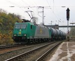 185 533-7 biegt mit einem Kesselwagenzug in Eichenberg aus Richtung Kassel kommend in Richtung Osten ab. Aufgenommen am 15.11.2014.