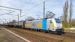 Railpool 91 80 6186 551 durchfährt am 27.03.2024 mit einem Kesselwagenzug den Bahnhof Dreileben-Drackenstedt in Richtung Osten.