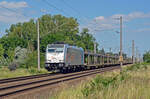 Am 25.06.24 führte 186 551 der HSL einen leeren BLG-Autozug durch Greppin Richtung Bitterfeld.