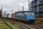 186 944 fährt mit einem Cotainerzug durch Grevenbroich Richtung Mönchengladbach durch Erftwerk.

Grevenbroich 25.01.2025